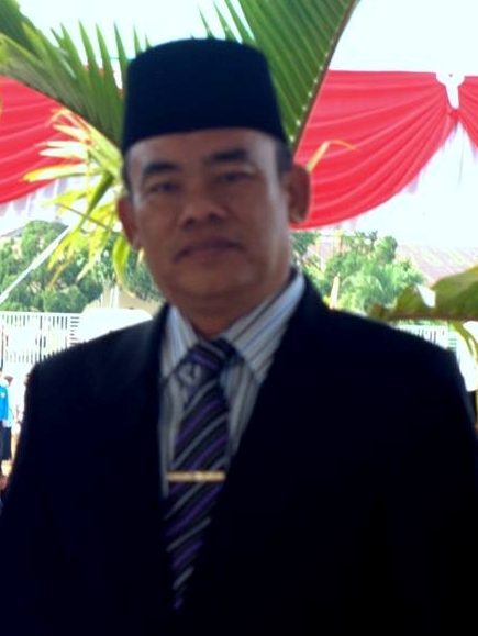 Drs. YASRI URIPSYAH, M.Si